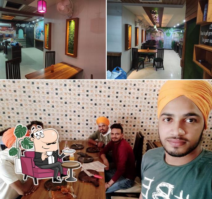 The interior of Enjoy Pizza Plus