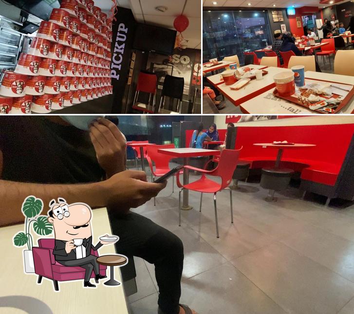 Take a seat at one of the tables at KFC