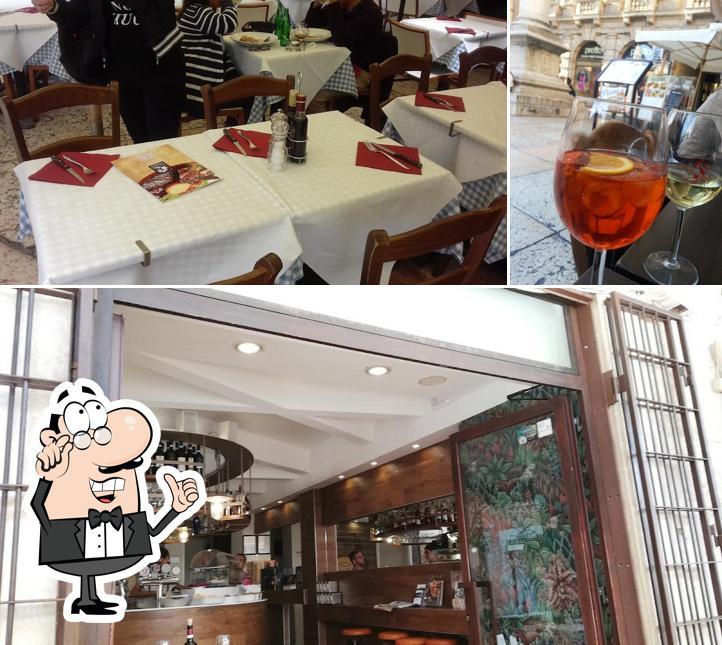 La immagine di interni e birra da Osteria Verona