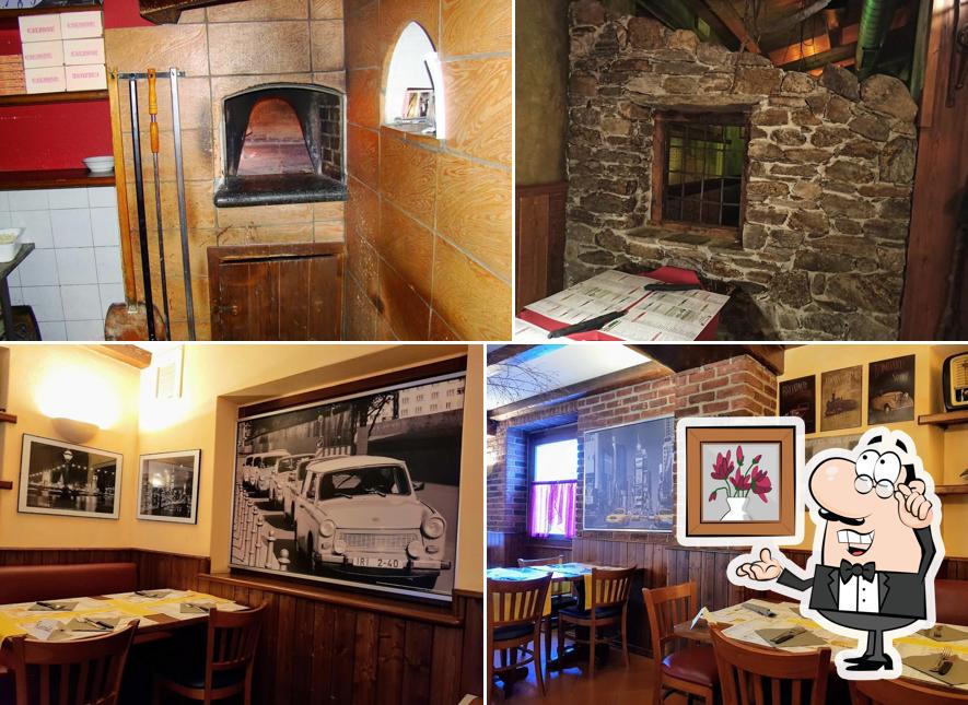 Dai un'occhiata agli interni di Pizzeria Daniel Pub