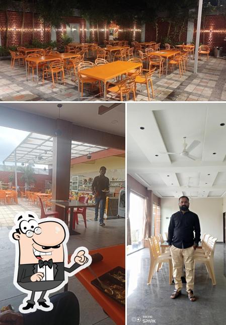 Take a seat at one of the tables at Shree Yashoda Garden