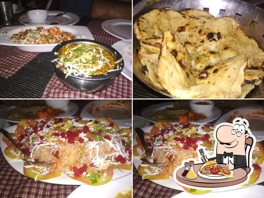 Pick pizza at Delight Hotel and Restaurant