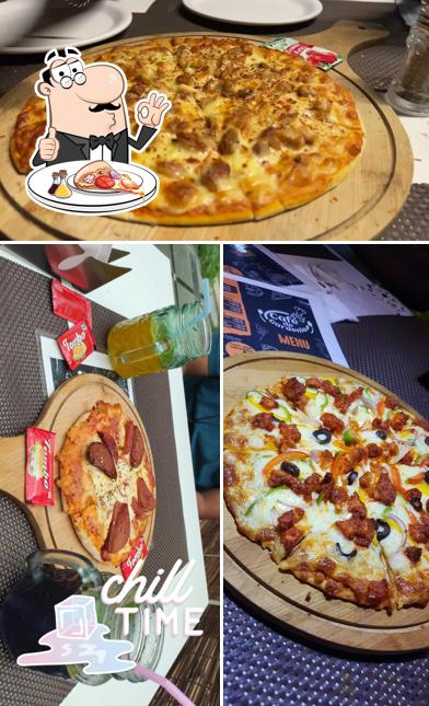 Get pizza at Cafe de Gardenia