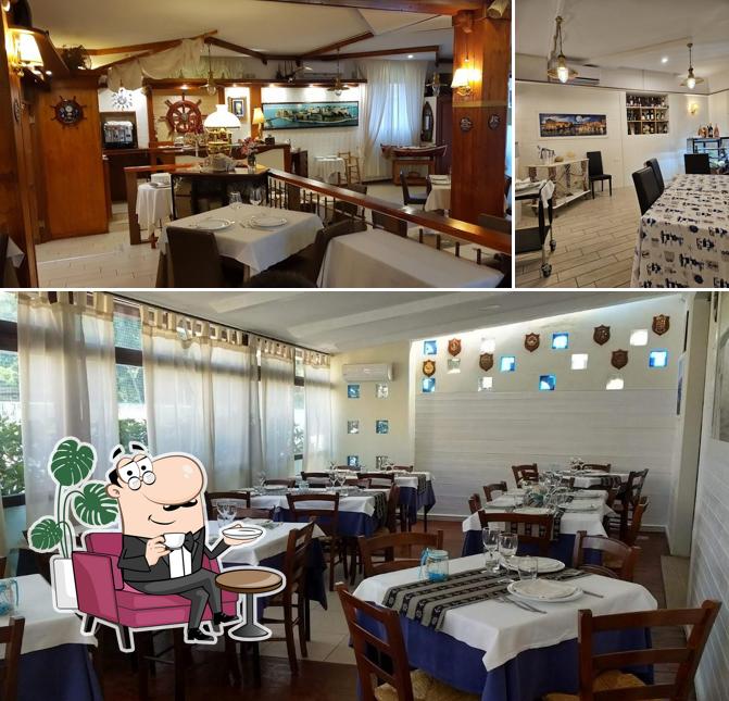 Dai un'occhiata agli interni di Ristorante al Piccolo Porticciolo