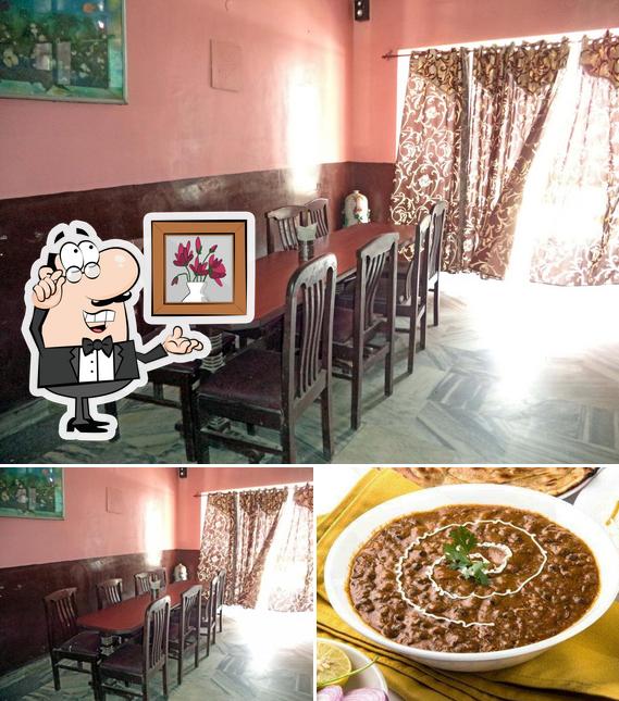 This is the image showing interior and food at Saini Dhaba