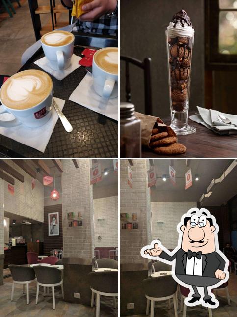 Take a seat at one of the tables at Café Coffee Day