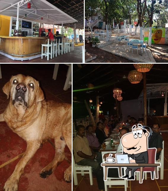 Take a seat at one of the tables at Mansher GOA