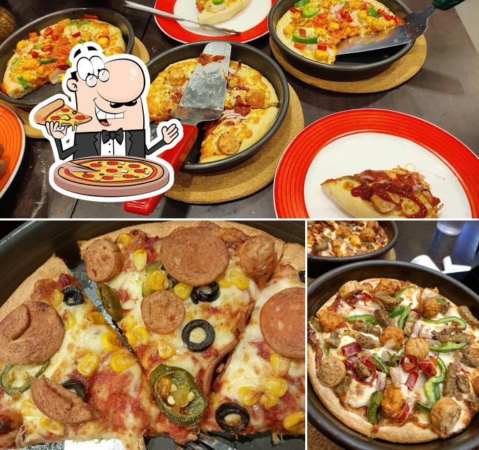 Order pizza at Pizza Hut Ashwini Junction, Thrissur