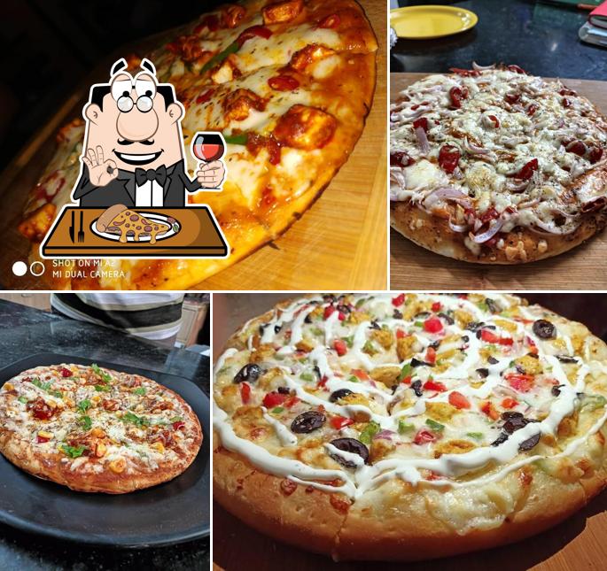 Pick pizza at Cafe De Devanshi