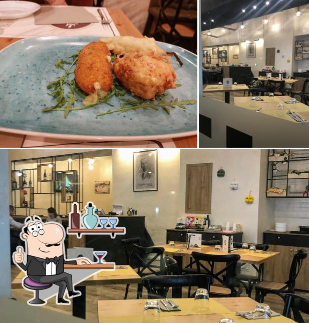 Guarda la immagine che raffigura la interni e cibo di Pizzeria Condurro - Via D’Annibale