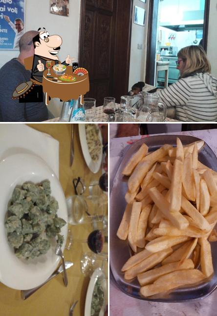 Tra le diverse cose da Vecchia Fattoria si possono trovare la cibo e tavolo da pranzo