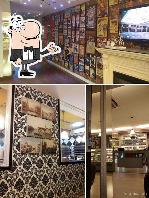 Take a seat at one of the tables at Mamma Mia Cafe