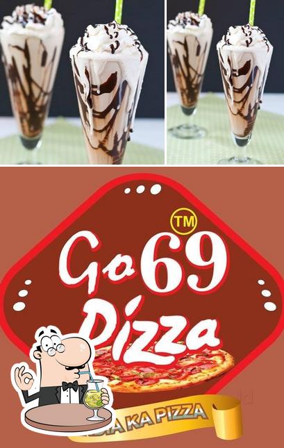The photo of Go69 pizza’s drink and food