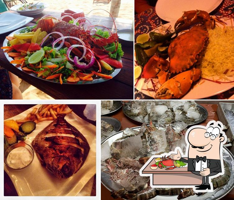 Get seafood at Tantra Cafe Restaurant and Beach Huts