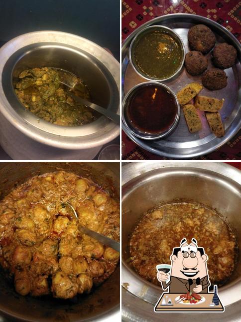 Try out meat dishes at The Village Restaurant R Mall Thane