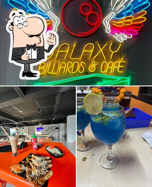 Look at the picture of Galaxy billiards & cafe