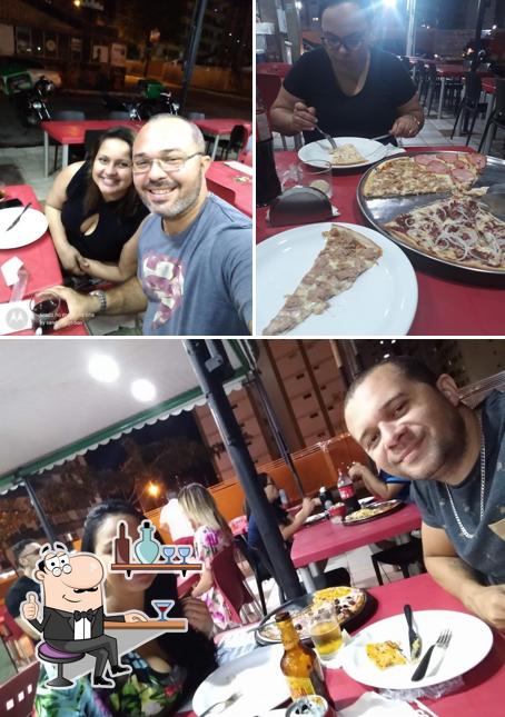O interior do Companhia da Pizza