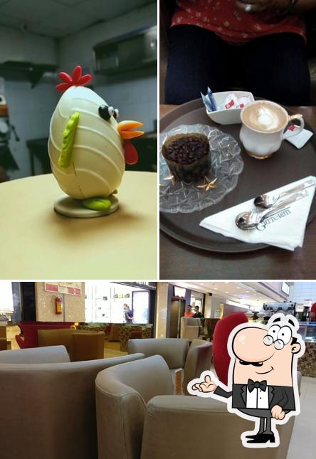 Take a seat at one of the tables at Cafe Glitterati