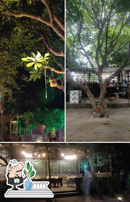 Among different things one can find exterior and interior at Khandoba The Forest Kitchen