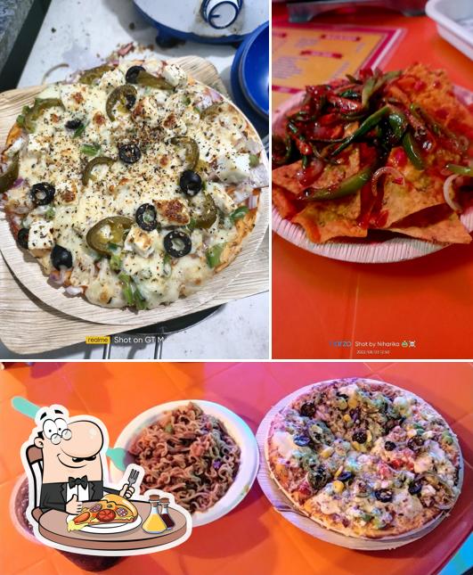 Try out pizza at De Diamond Cafe