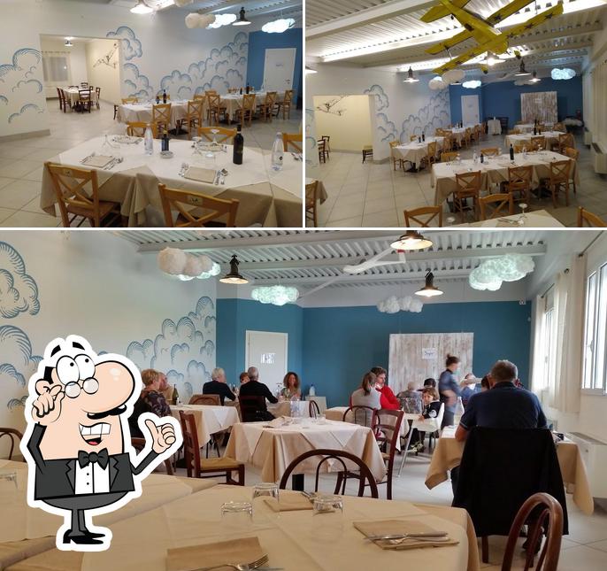 Dai un'occhiata agli interni di Trattoria il Gusto del Volo