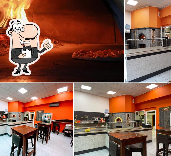 Dai un'occhiata agli interni di Pizza al Giulia