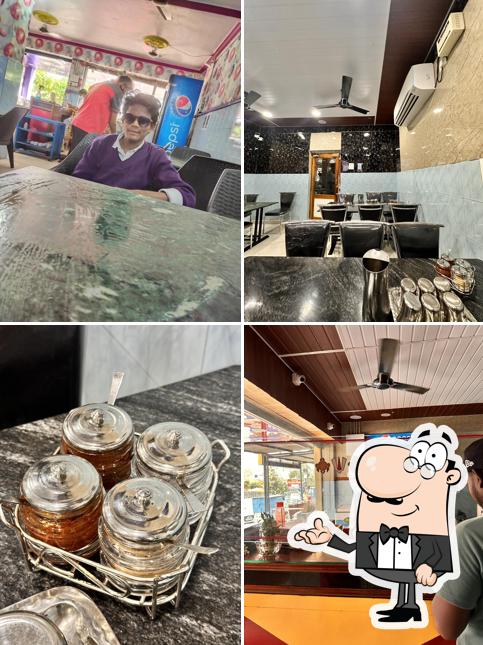 The interior of Hotel Sri SaiBalaji pure vegetarian restaurant (AC)