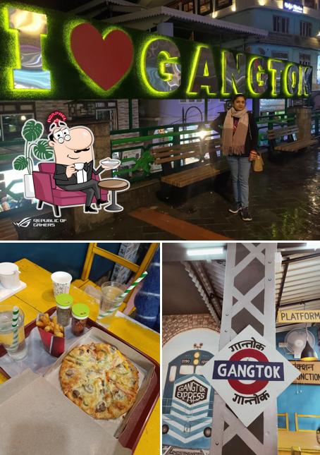 Take a seat at one of the tables at Gangtok Station