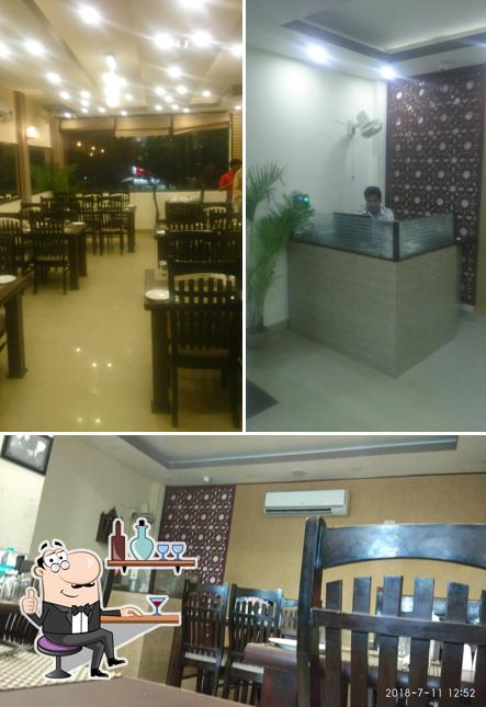 Take a seat at one of the tables at Moti Mahal Delux
