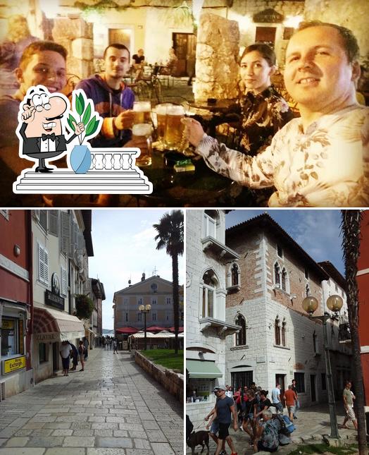 La foto della esterno e bancone da bar di Comitivm