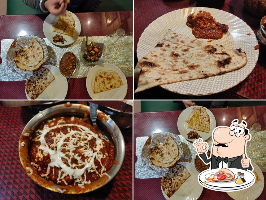 Get pizza at Paradise Kitchen