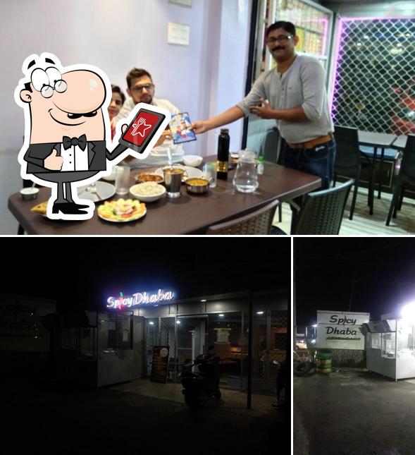 Take a look at the picture showing exterior and interior at Spicy Dhaba multi cuisine restaurant