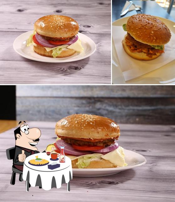 Order a burger at The Pizza Box & Cafe Sinhagad road Pure Veg