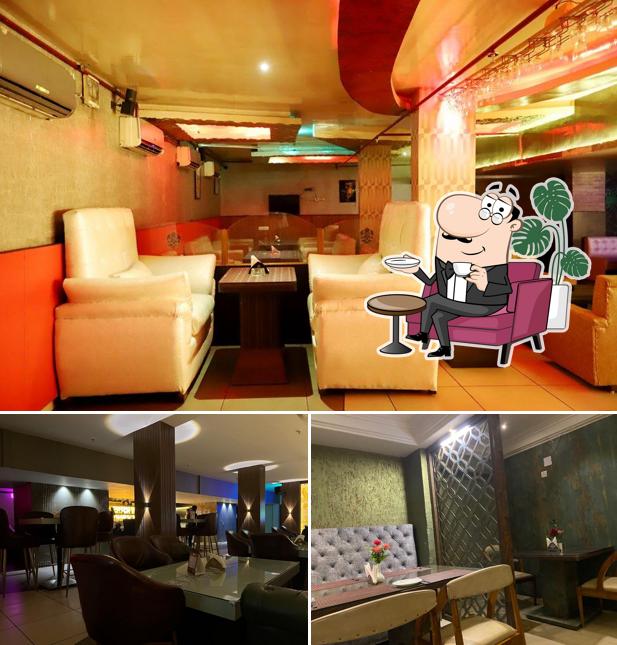 Take a seat at one of the tables at Bar Cloud9 & Lounge