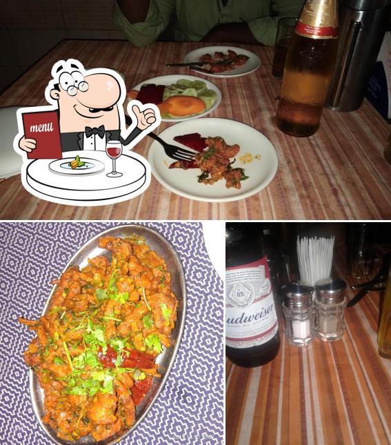 Check out the image depicting food and alcohol at Mehfil Restaurant And Bar