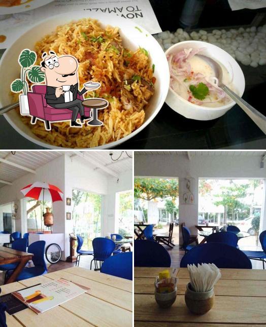 The photo of interior and food at Little Pondy