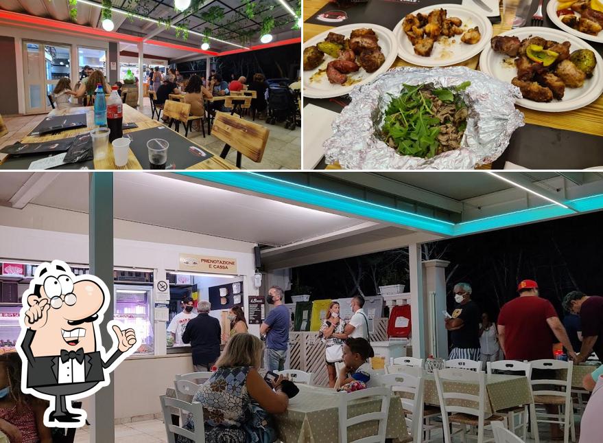 La foto della interni e cibo di Braceria De Pasquale