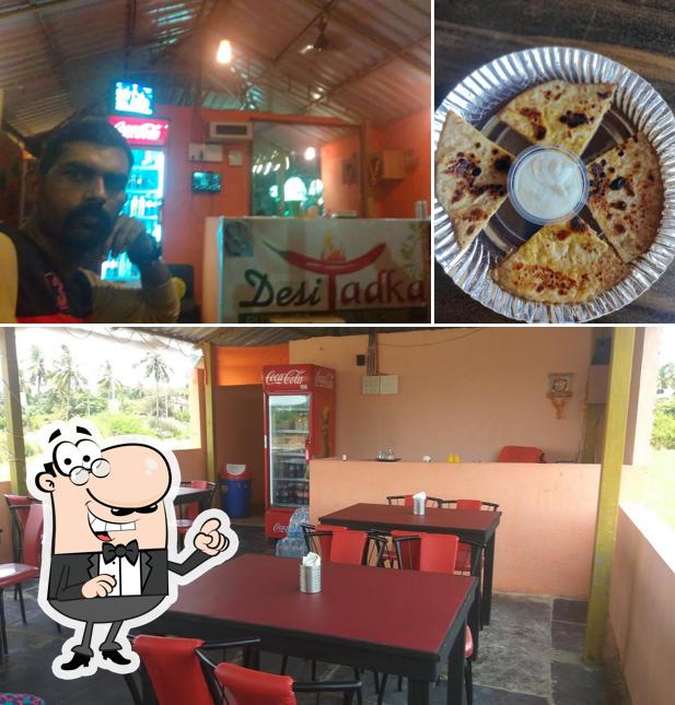 Among various things one can find interior and pizza at Desi Tadka