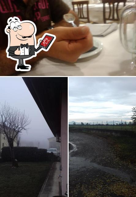 Questa è la immagine che mostra la esterno e interni di Trattoria Breda Di Moretti Angelo