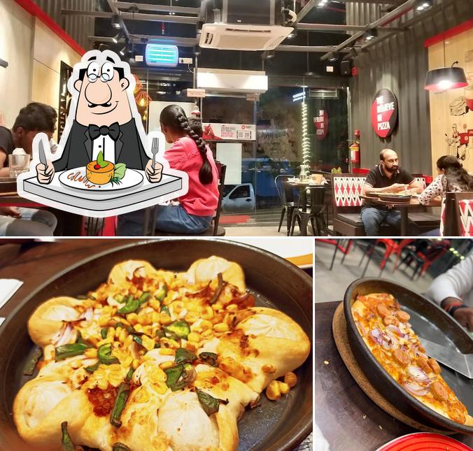 This is the image showing food and interior at Pizza Hut Jayanagar, Bangalore