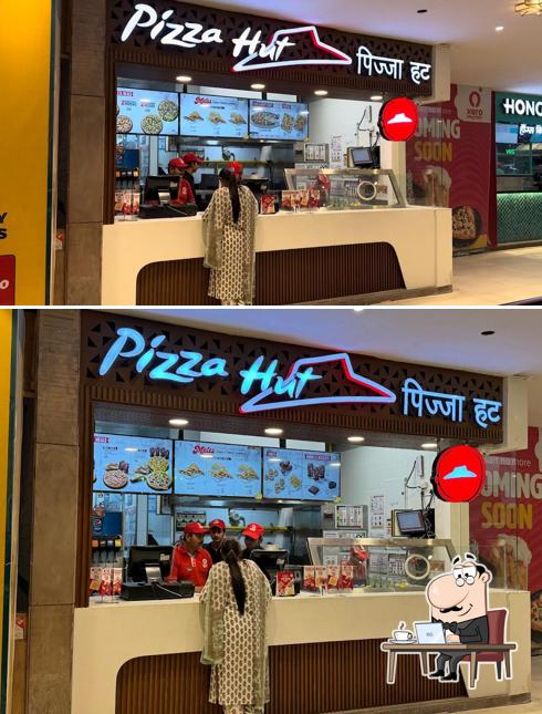 The interior of Pizza Hut Omaxe Chandni Chowk, Delhi