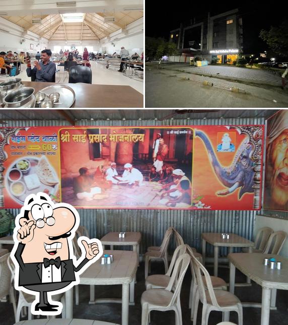 The image of interior and exterior at Shri Sai Prasad Bhojnalaya