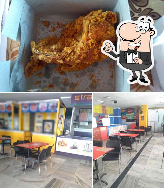 Take a look at the picture displaying interior and food at Wingswala