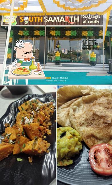 The photo of food and interior at South Samarth