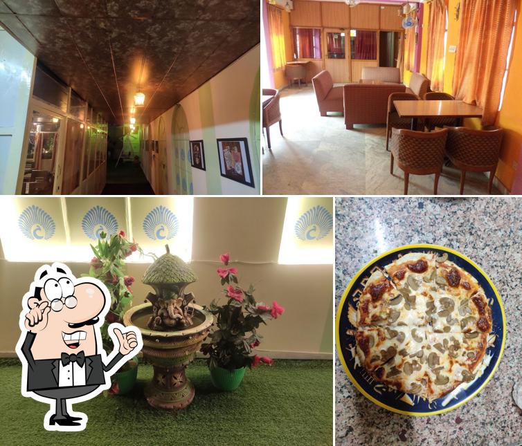 Check out the picture displaying interior and food at Trattoria italian restaurant