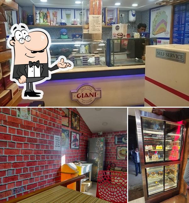 Take a seat at one of the tables at Cake Masters (Giani's)