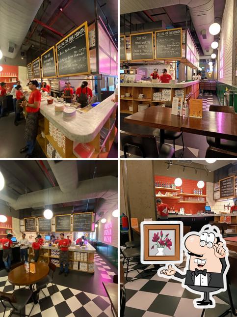 The interior of Jamie's Pizzeria by Jamie Oliver