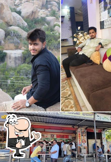 Look at the image of Sri Sai Bhavan Hotel Pure Veg...Restaurant