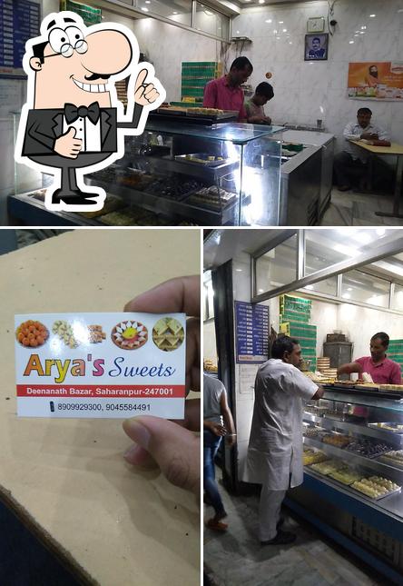 Look at the picture of Arya Sweets