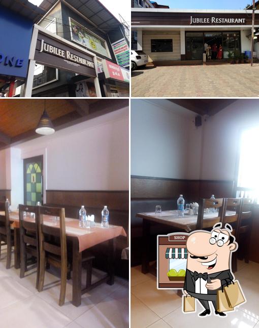 Take a look at the photo showing exterior and dining table at Jubilee Restaurant